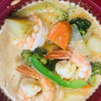 ShrimpThai Yellow Curry Rice Bowls · Served with potato, broccoli, carrot, and yellow onions.
