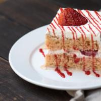 Tres Leches Cake · Huge slice of our strawberry tres leches cake