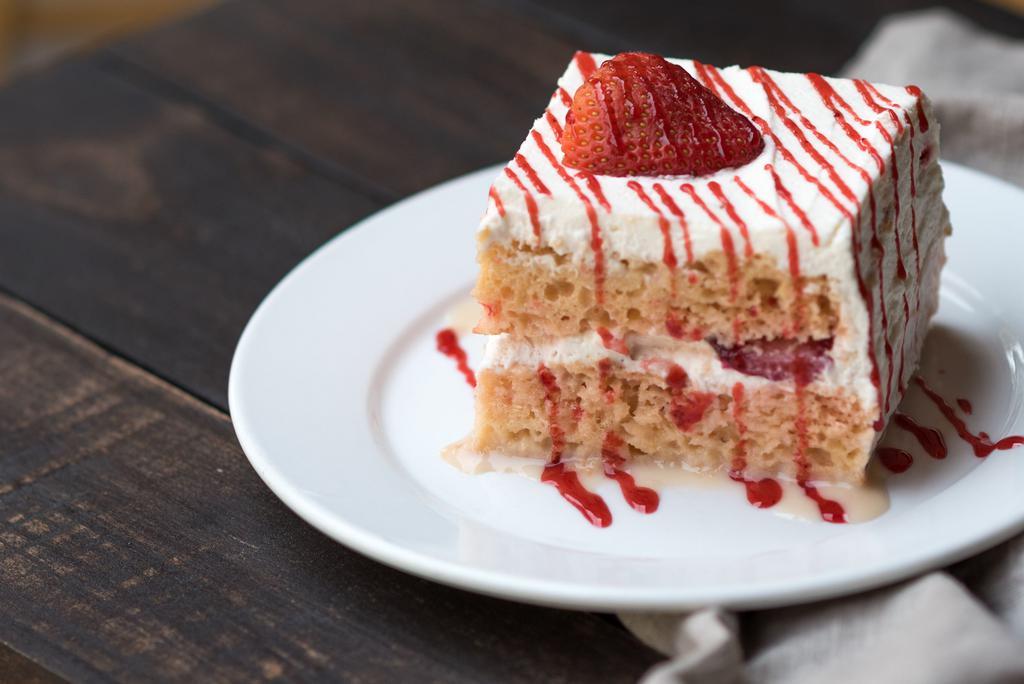 Tres Leches Cake · Huge slice of our strawberry tres leches cake