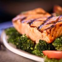 Salmon Teriyaki · Salmon steak grilled to perfection glazed with homemade teriyaki sauce, served with a side o...