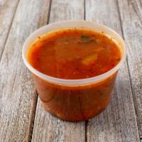 Minestrone Soup · An Italian staple. Fresh vegetables, beans, and pasta in an herb-infused tomato broth. Toppe...