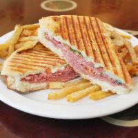 The Italian Panini · Salami, capicola, mozzarella cheese, tomatoes and fresh basil on Fresh House Made focaccia b...