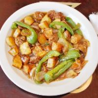 Spicy Italian Sausage and Peppers Dinner · Spicy Italian sausage grilled and sauteed with green peppers, onions and potatoes. Served wi...