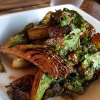 Flash Fried Brussels Sprouts · Mint, cilantro, lemon and chili vinaigrette.