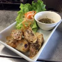 2 Pieces Fried Vegetable Egg Rolls · Egg roll skin, mushroom, carrot, onion, cabbage, taro, served with green leaf lettuce and so...