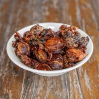 Brussel Sprouts · Tossed in a sweet Asian sauce.