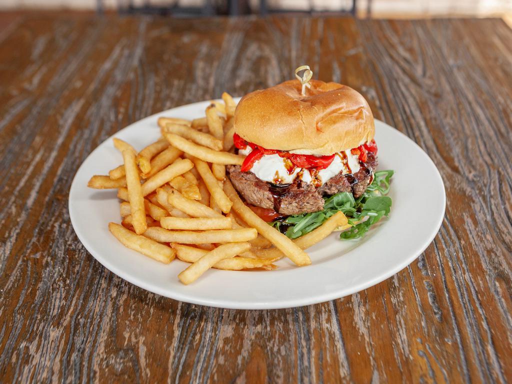 Sonoma Burger · Topped with goat cheese, roasted tomato, roasted pepper, arugula and balsamic glaze.