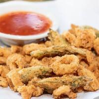 Flash Fried Calamari · Thinly sliced wild calamari and okra halves, hand-battered and flash-fried. Served with choi...