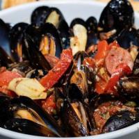 Mussels Barcelona · One pound of Chilean mussels tossed in a spicy marinara, Andouille sausage, white wine, red ...