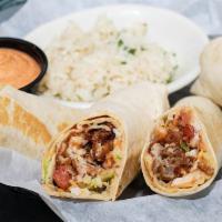 Santa Fe Tacos · A Rockfish classic! Choice of crispy fried wild Alaska Pollock or shrimp, wrapped in large f...