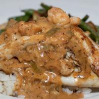 Crab Stuffed Fish · Blackened tilapia stuffed with a lump crab cake and  smothered in our homemade Pontchartrain...