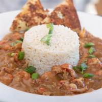 Crawfish Etouffee · Homemade, spicy, Louisiana style étouffée full of crawfish tails, served with white rice and...