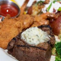 Surf & Turf · Large Shrimp and an Aged 8oz. beef tenderloin filet seasoned with our signature Rockfish spi...