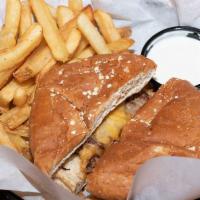 Cheeseburger · A quarter pound burger topped with cheddar-jack cheese served on a toasted bun. Served with ...