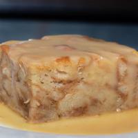 Bread Pudding · Homemade bread pudding topped with our sweet bourbon butter sauce.