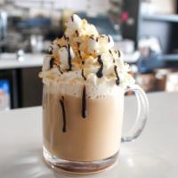 Toasted Marshmallow · Toasted marshmallow, chocolate, milk and espresso. Topped with chocolate sauce and toasted m...