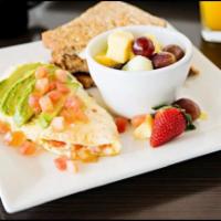 Avocado Egg White Omelette · Tomatoes and fresh mozzarella. topped with half of an avocado. served with a fresh fruit cup...