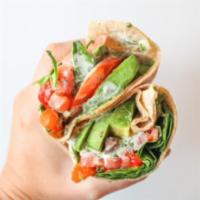 Veggie Wrap · Avocado, sauteed portobello mushrooms, roasted red peppers, spinach, tomatoes, and mariachi ...