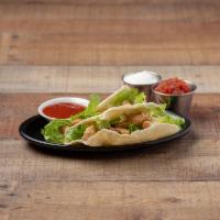 Grilled Chicken Tacos · Marinated with chipotle peppers and lime. Two tacos topped with salsa, sour cream, chipotle ...