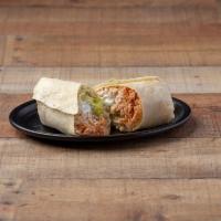 Grilled Chicken Burrito · Marinated with chipotle peppers, lime and spices. A huge stuffed and rolled burrito with cho...