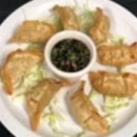 Pot Stickers Pupu (8 pcs) · Served with dipping sauce.