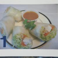 1. Salad Rolls · Fresh vegetable and tofu wrapped in rice paper, served with peanut sauce. 2 rolls. 