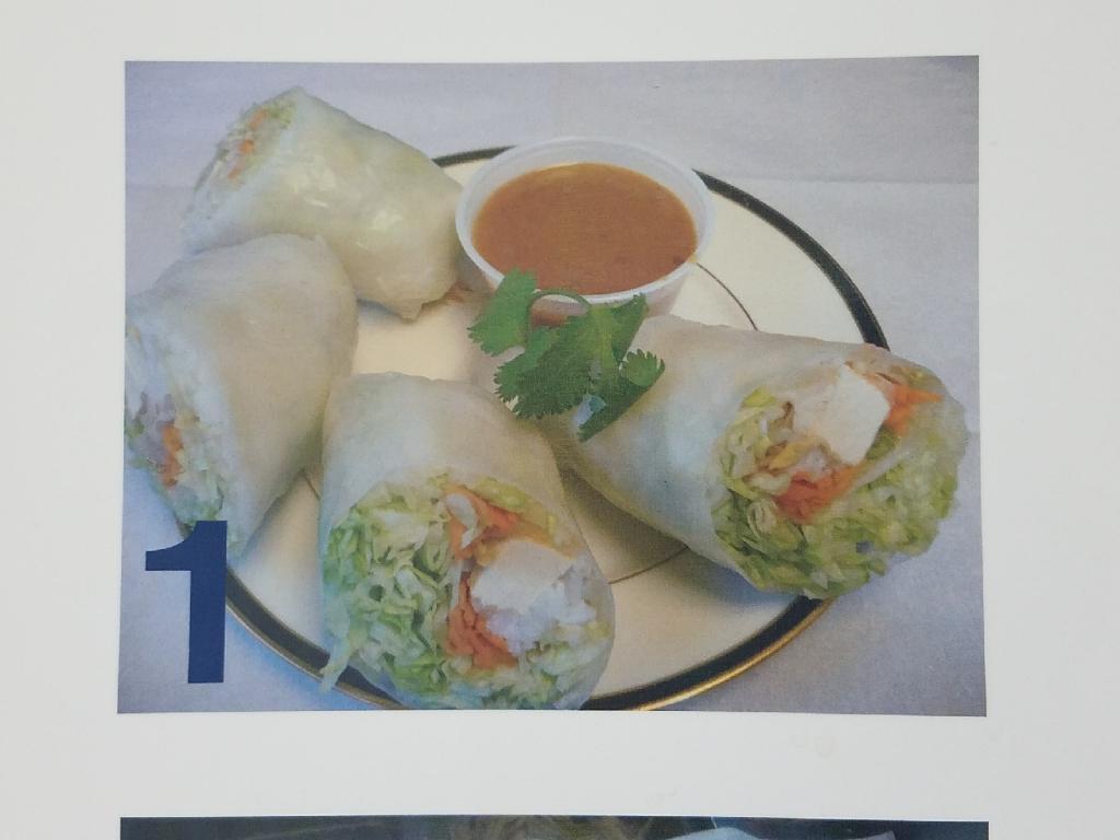 1. Salad Rolls · Fresh vegetable and tofu wrapped in rice paper, served with peanut sauce. 2 rolls. 