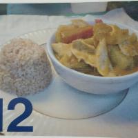 12. Yellow Curry · Yellow curry in coconut milk with potato, carrot, onion and bell pepper.