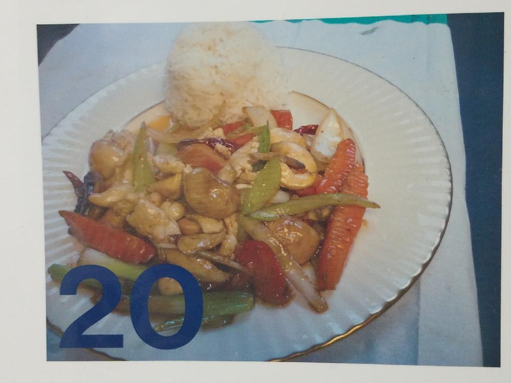 20. Pad Cashew Nut · Bell pepper, onion, carrot, celery, mushroom, and cashew nuts stir-fried in Thai chili paste.