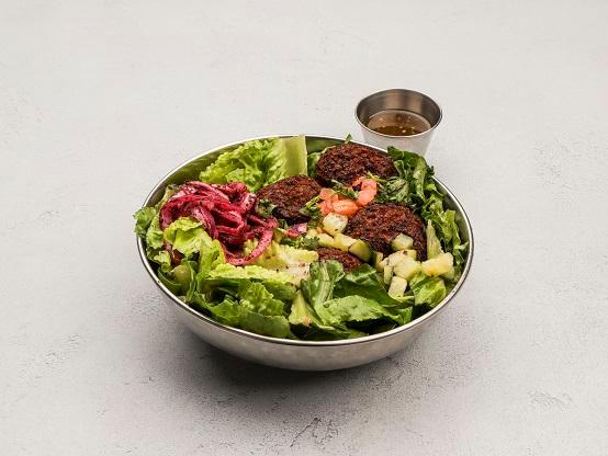 Falafel Salad · Romaine lettuce protein, pita, sauce and toppings. Vegan.