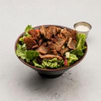 Gyro Salad · Romaine lettuce protein, pita, sauce and toppings.