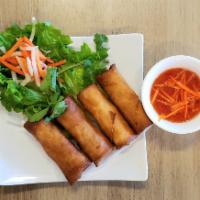 A2. Egg Rolls · 4 Egg rolls filled with mixed ground pork, taro, carrots, onions, and mushrooms. Served with...