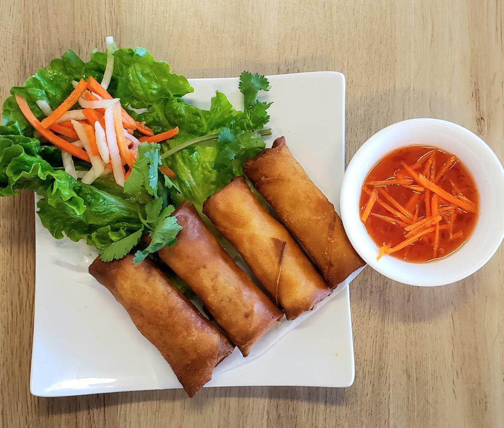A2. Egg Rolls · 4 Egg rolls filled with mixed ground pork, taro, carrots, onions, and mushrooms. Served with sweet and sour sauce.