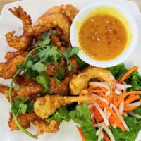A5. Butterfly Crispy Shrimp · Eight pieces of shrimp dipped in batter and fried to a crisp