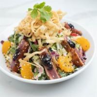 Seared Ahi Salad · Ahi tuna filet, seared rare with Cajun spices. Arugula, radicchio, Napa slaw & spring salad ...