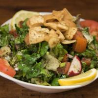 Fattoush فتوش · Lettuce, tomatoes, cucumber, radish, green onions and mint, seasoned with olive oil and lemo...