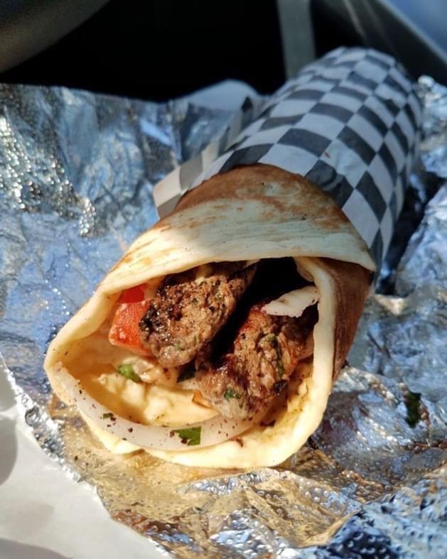 13. Tri-Meat Wrap لحم ودجاج صاج · Chicken, lamb, beef mixed with parsley, tomato, lettuce, onion, and Mediterranean spices. Hummus.
