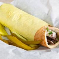5. Beef Shawarma Gyro لحم جـايرو · Shredded beef, tahini sauce, onion, lettuce, parsley, tomato & pickles.