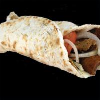 7. Lam Wrap لام صــــاج · Lamb. Spread off hummus, parsley, and Mediterranean spices, with tomato and onion, lettuce.
