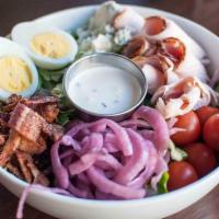 Stella's Cobb Salad · Point Reyes blue cheese, organic mixed greens, egg, organic cherry tomatoes, pickled red oni...