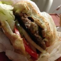 Sauteed Mushroom Burger · With mushrooms, mayonnaise, ketchup, lettuce, tomato, pickles, and onions.