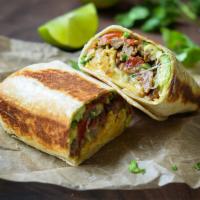Breakfast Burrito · A warm tortilla filled with scrambled eggs, pepper jack cheese, grilled onions, peppers and ...