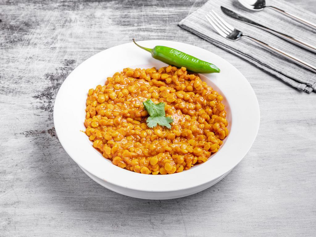 Chana Dal Curry · Cooked in fresh onions, tomatoes, and spices.