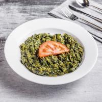 Sabzi · Spinach. Fresh spinach cooked with tomatoes, onions, and spices.