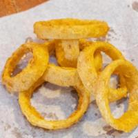 Hand Breaded Onion Rings · Hand breaded and cooked to order.