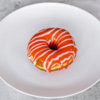 Orange Dreamsicle Donut · Orange infused icing with vanilla cream.