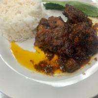 Large Oxtail · Seasoned, marinated and caramelized.. then slowly braised until tender and falling off the b...