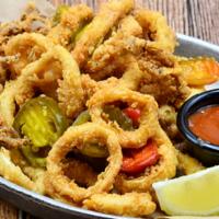 Spiked Calamari · Tossed with cherry peppers & a side of spicy marinara.