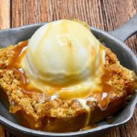 Apple Crumble · Granny Smith apples, Foster sauce & vanilla ice cream.