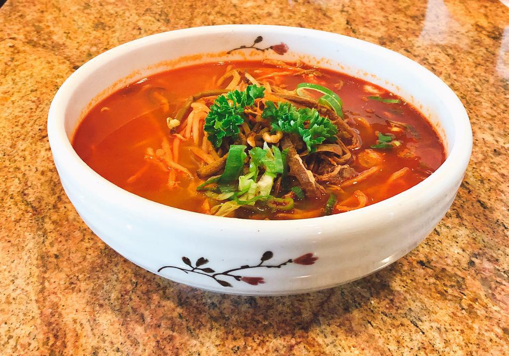 Spicy Beef Stew (육개장) · Shredded beef brisket, glass noodle, green onion and egg in spicy beef broth.
